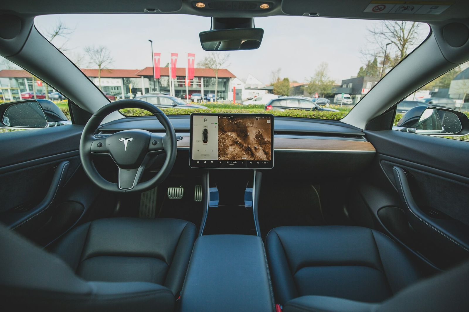 Habitacle d'une Tesla Model 3 avec son grand écran central
